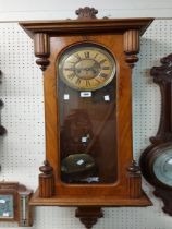 An early 20th Century walnut cased regulator style wall clock with Gustav Becker spring driven