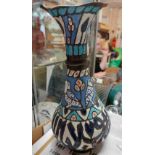 An antique Persian Meenakari vase with vibrant coloured bird and Arabic enamel decoration - a/f