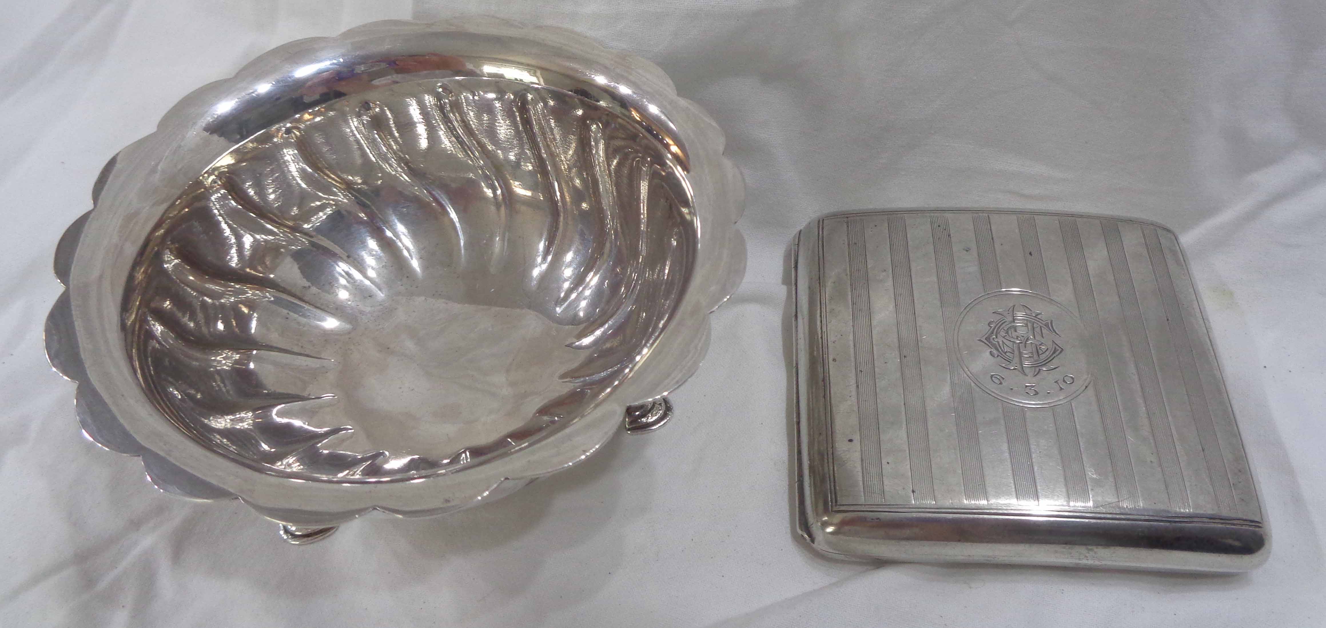 A silver bowl with scalloped rim, set on triple hoof pattern feet - sold with a Chester silver