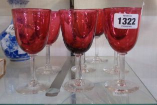 A set of six Edwardian cranberry glass bowl drinking glasses - sold with another similar