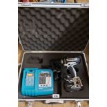 A cased Makita LI/ION rechargeable drill