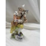 An antique Chelsea style porcelain figurine, depicting a man with a goat - gold anchor mark to