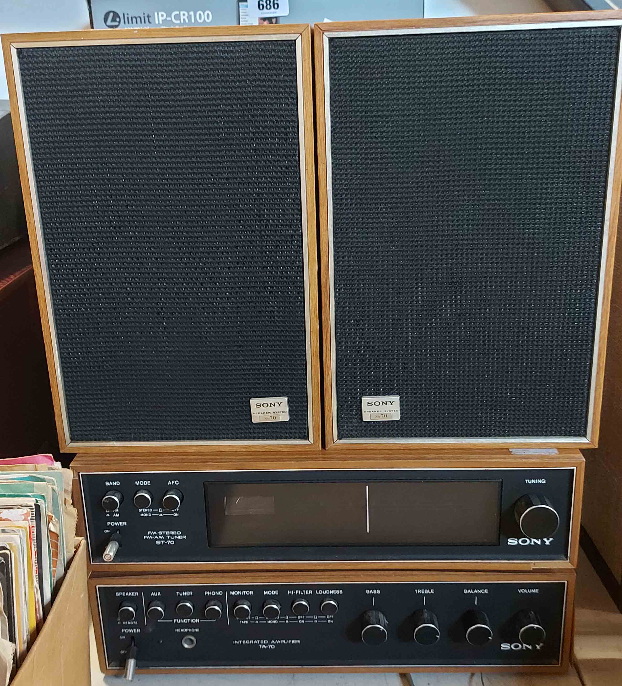 A vintage Sony hi-fi set including tuner, amplifier and speakers in teak effect finish