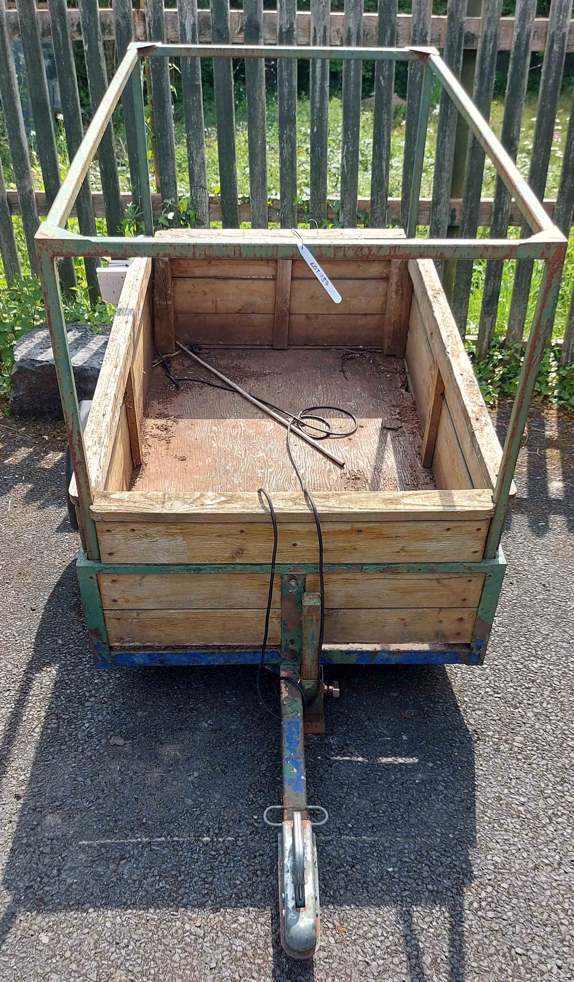 A box trailer with wooden sides