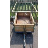 A box trailer with wooden sides