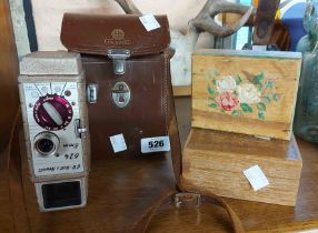 A vintage cased Bell & Howell 8mm camera - sold with a set of Sorrento style trinket boxes and a