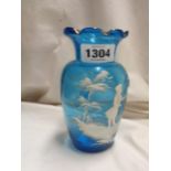 A 19th Century blue glass vase with Mary Gregory style enamel decoration
