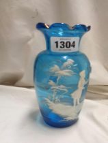 A 19th Century blue glass vase with Mary Gregory style enamel decoration