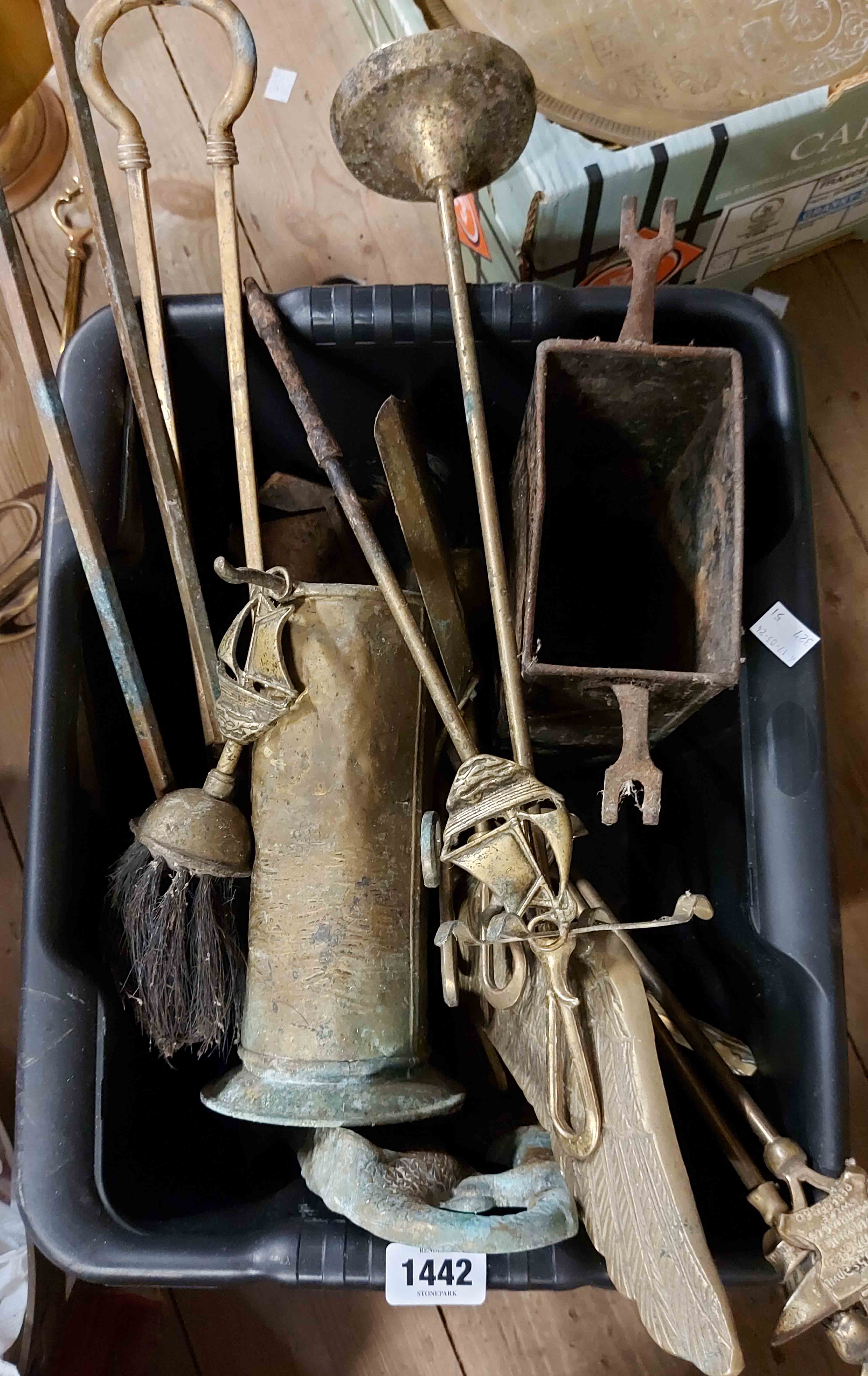A box containing a quantity of mixed brass items including fire accessories, etc.