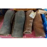 Two pairs of old leather gaiters one black, one brown