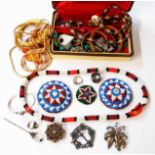 A box containing a quantity of ethnic and other costume jewellery necklaces and other items
