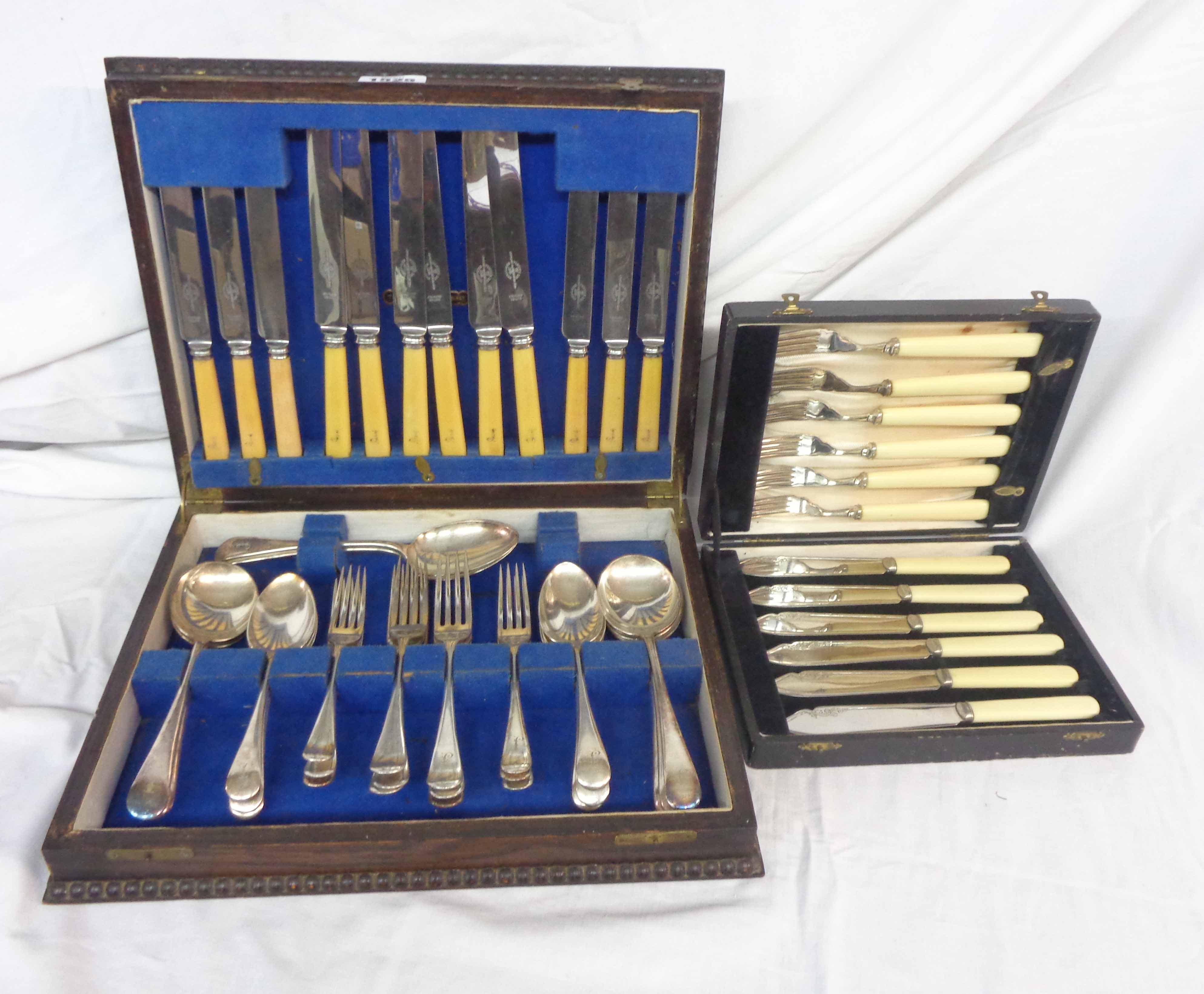 A canteen containing a six place setting of silver plated cutlery - sold with a cased set of fish