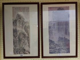 A pair of framed reproduction Chinese coloured prints, both depicting river mountain landscapes