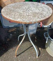 A small garden table with tile top - a/f