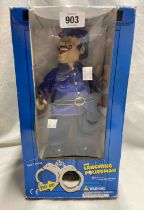 A vintage Laughing Policeman boxed toy
