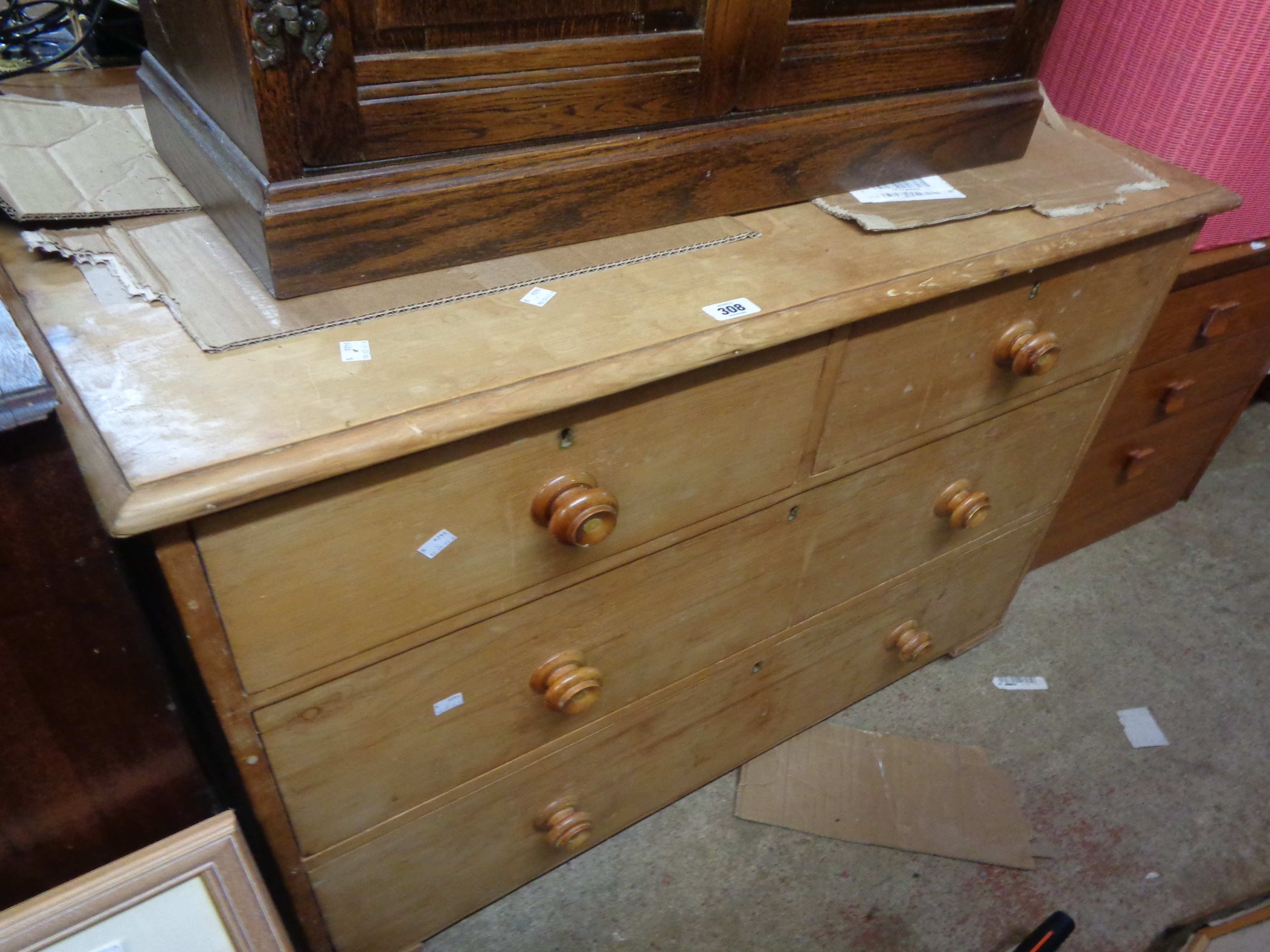 A 1.02m Victorian stripped pine low chest of two short and two long drawers, set on later Shepherd