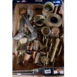 A box containing a quantity of metalware including ornamental brass cannons, spelter pheasants,