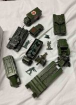 A box containing a quantity of vintage Dinky and Corgi toy army vehicles including Chieftain,
