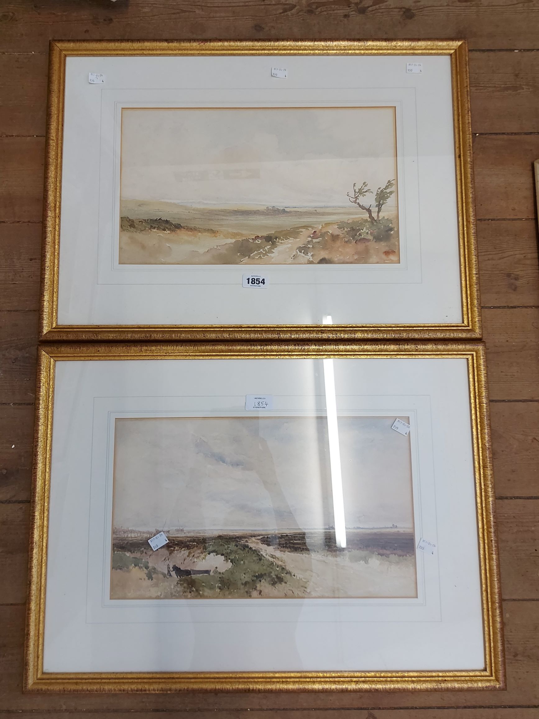 A pair of gilt framed English School watercolours, both depicting Norfolk views - bearing labels