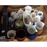 A box containing a quantity of ceramics including jugs, vases, etc.