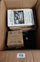 A box containing collectable fishing accessories including a Hardy reel Uniqua 3 1/2", etc.