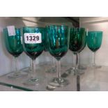 Nine Edwardian green bowl wine glasses