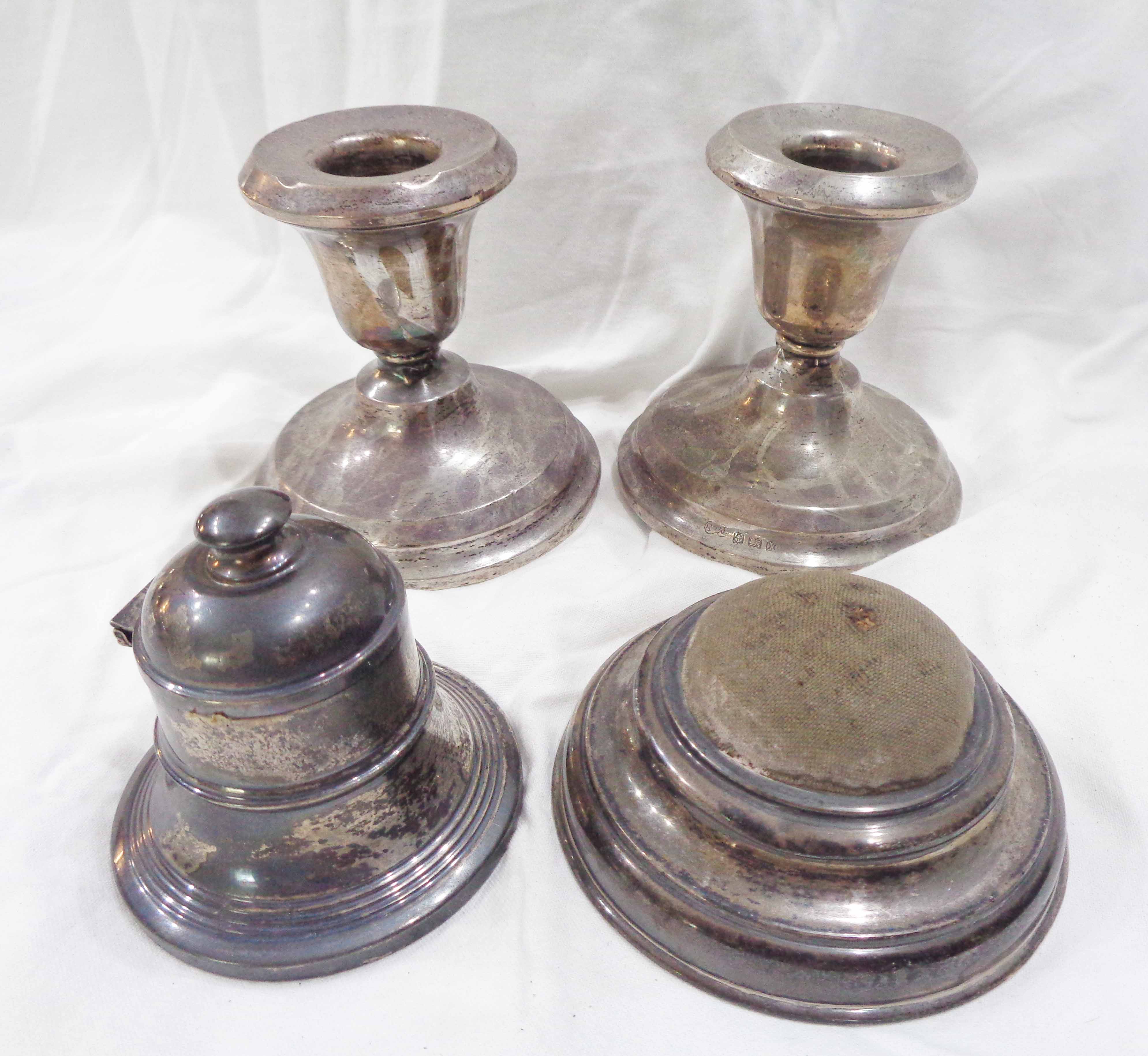 A small silver flip-top capstan inkwell with clear glass liner - sold with a silver mounted pin