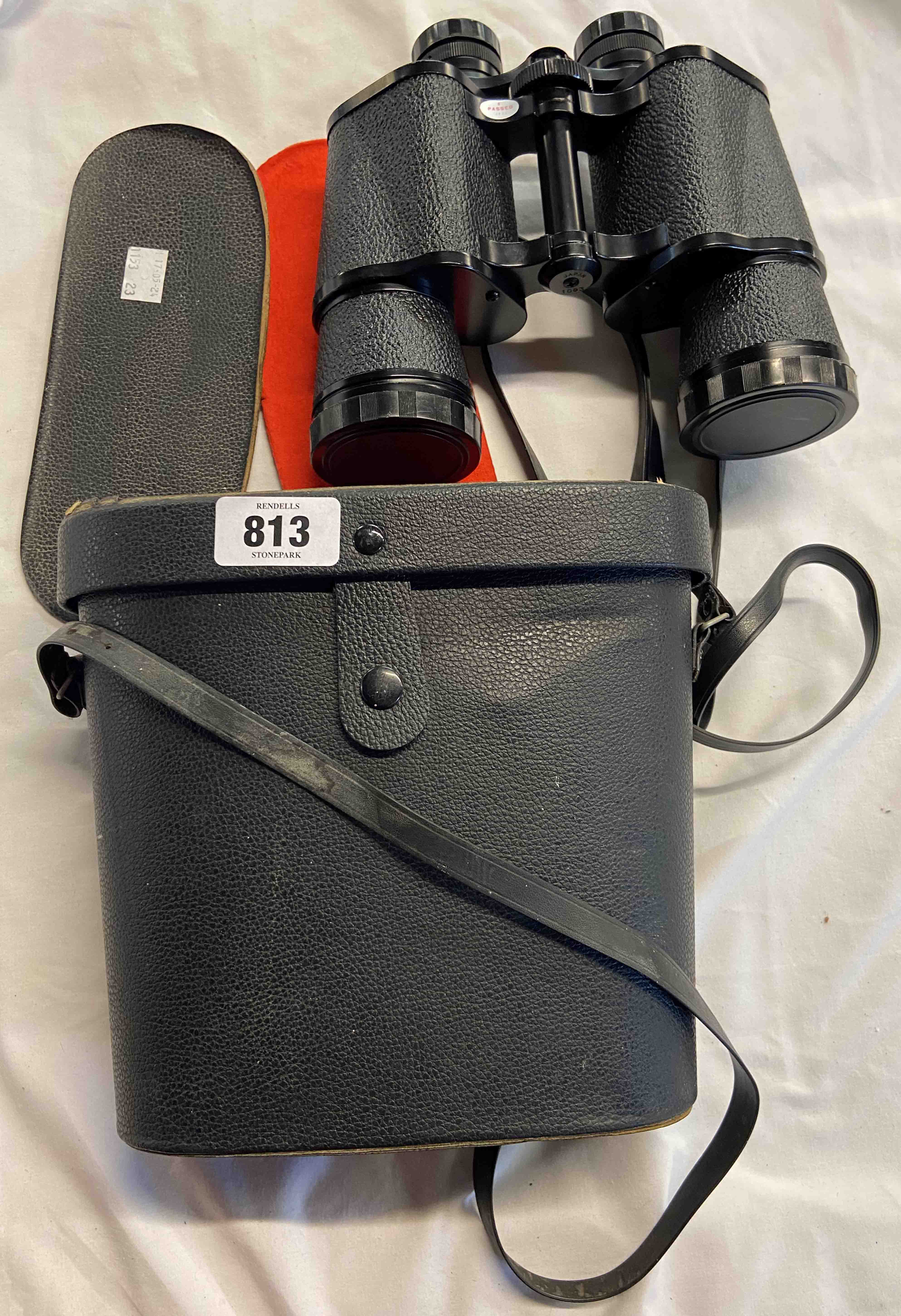 A cased set of Super Zenith 10X50 binoculars