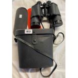 A cased set of Super Zenith 10X50 binoculars