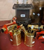 A Beatrice paraffin stove - sold with two polished brass blow lamps