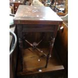 A 48cm Edwardian stained walnut envelope card table with blue baise lined interior, set on turned