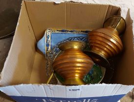 A box containing a quantity of metalware and other items including two copper and brass jugs, etc.