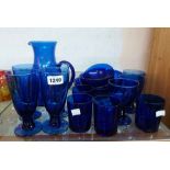 A quantity of blue glassware including lemonade set, goblets, bowls, etc.