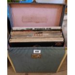 A record case containing LPs and singles including Beatles 'Help', etc.