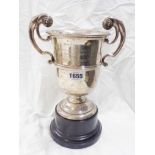 A 22cm high Walker & Hall silver trophy cup with flanking acanthus scroll handles with 'South