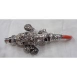 A late Victorian silver baby's rattle with applied bells (two missing) and red coral comforter -