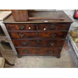 A 94cm 18th Century walnut and mixed wood chest of two short and two long drawers, set on bracket