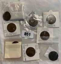 A small collection of Devon coin tokens