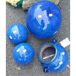 Three ceramic balls - sold with a blue pot