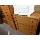 A retro Stag teak effect three piece bedroom suite comprising one 82cm chest with flight of five