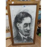 A framed charcoal and pencil drawing head and shoulders portrait of a gentleman with moustache -