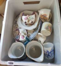 A crate containing a quantity of ceramics including jugs, commemorative china, etc.