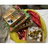 A bag containing a quantity of vintage Christmas decorations