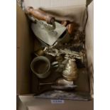 A box containing a quantity of metalware including brass wall bell, slug iron, etc.