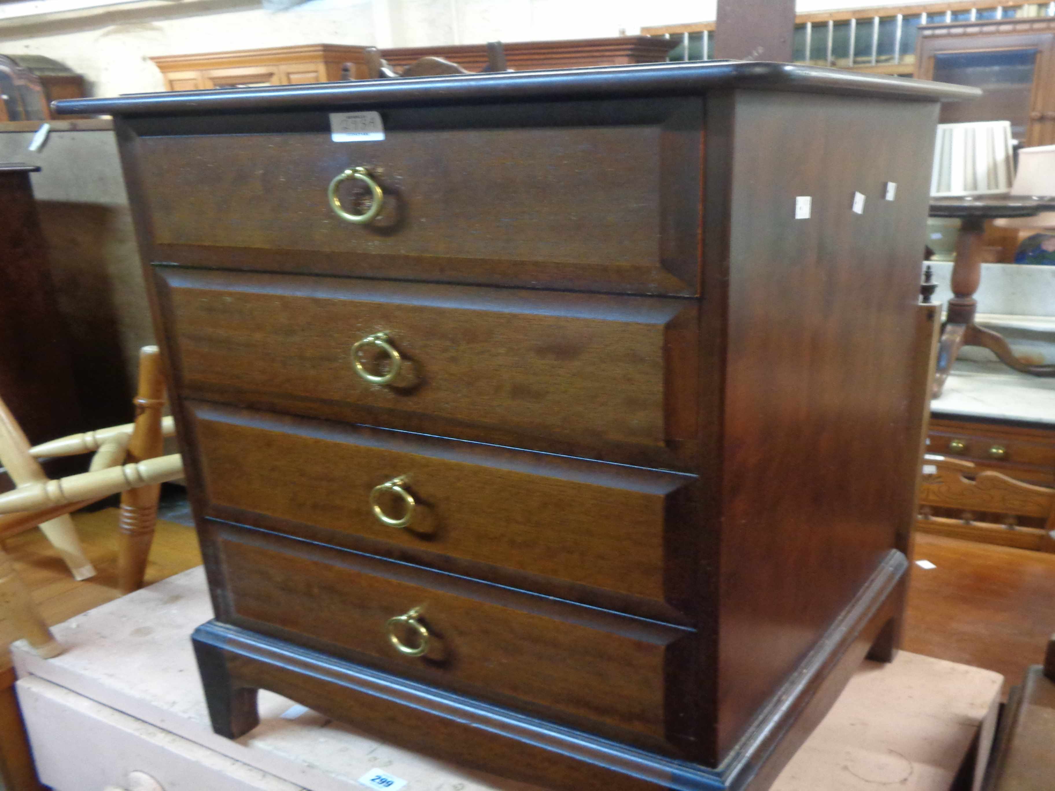 A pair of Stag Minstrel three drawer bedside chests