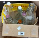 A box containing six vintage style bottles with stoppers bottles