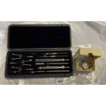 A vintage cased set of drawing instruments - Lee Guinness Ltd. Belfast - sold with a chrome plate