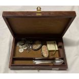 A small box containing two silver teaspoons, silver 3d, 6d, Shilling, etc.