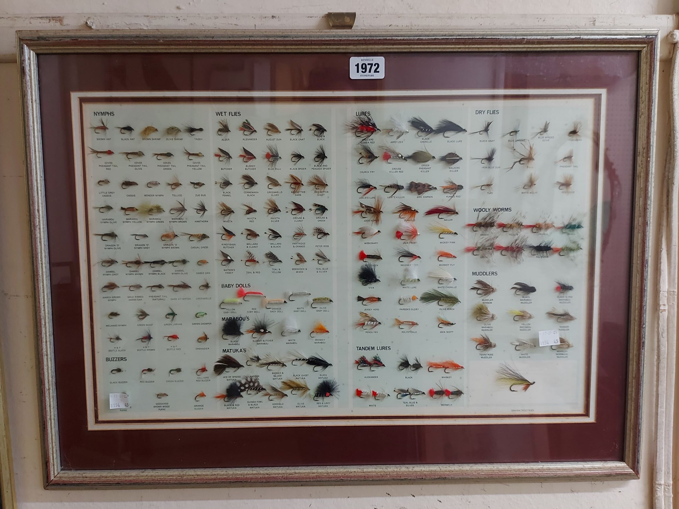 A framed display of mounted and named 'Graham' Trout Flies