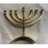 A modern Karshi gold plated Menorah (candle holder)